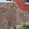 Рваный камень в отделке фасада: особенности использования